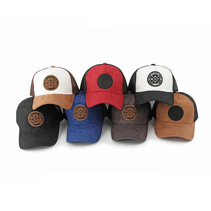 A retro-style suede work cap with a leather logo and breathable mesh design, suitable for both men and women to wear casually.