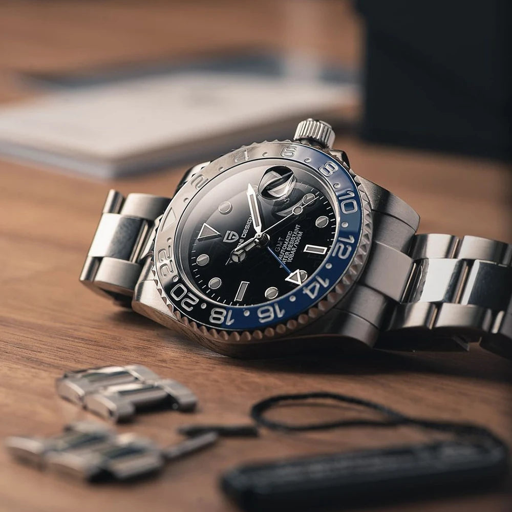 Montre mécanique pour homme PAGANI DESIGN (40 mm) – Cadran violet, fonction GMT, bracelet type Jubilee, verre saphir, étanche, mouvement automatique