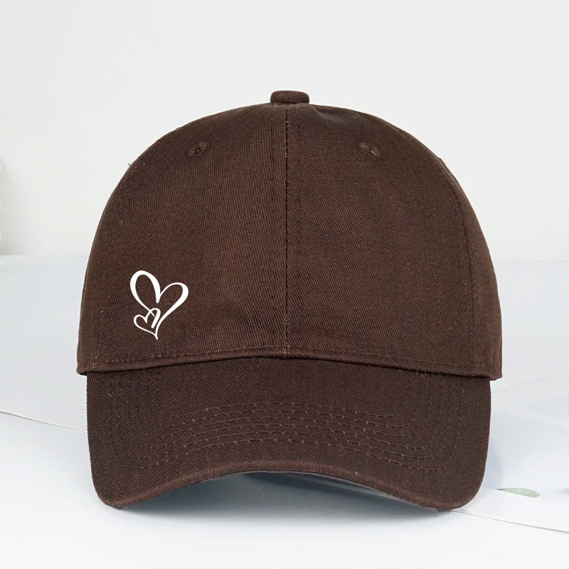 Gorra de béisbol minimalista con estampado de dos corazones, para mujer y hombre, suave y ajustable, estilo «dad hat», informal, con temática romántica, para el sol