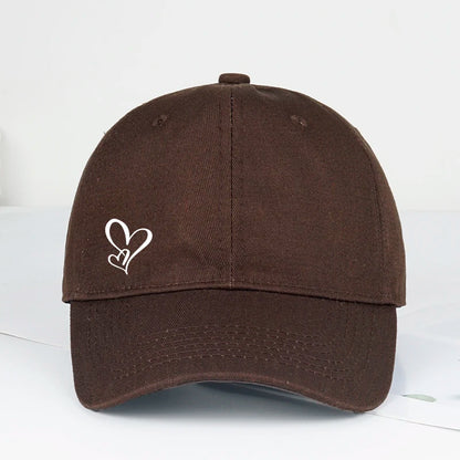 Gorra de béisbol minimalista con estampado de dos corazones, para mujer y hombre, suave y ajustable, estilo «dad hat», informal, con temática romántica, para el sol