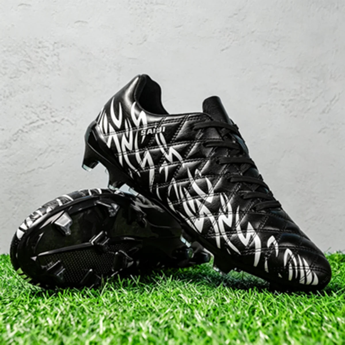 Chaussures de football pour hommes, modèle AG FG hybride, semelle extérieure en caoutchouc résistant à l’usure, tige en PU respirant, idéales pour les matchs sur gazon naturel.